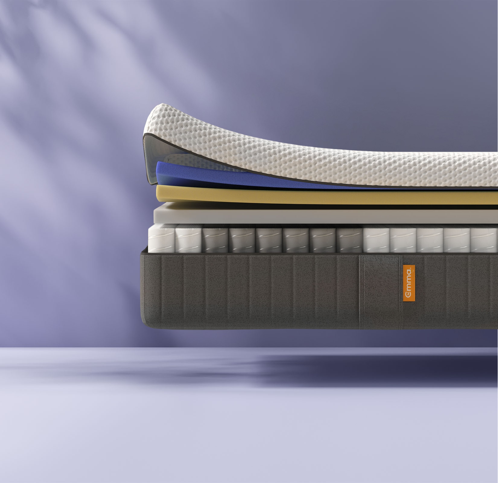  Imagem do colchão Emma Original, com detalhes das camadas visíveis.