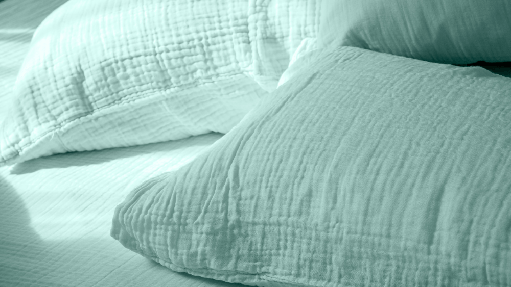 Oreiller avec taie colorée.