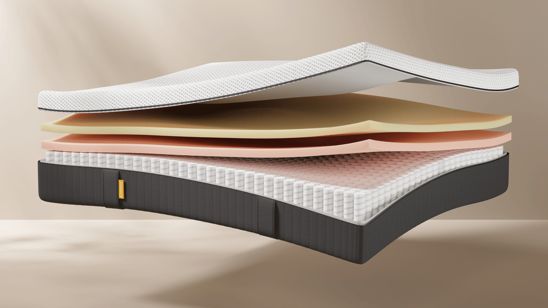 The side view of the Emma Hybrid Original mattress with visible layers.