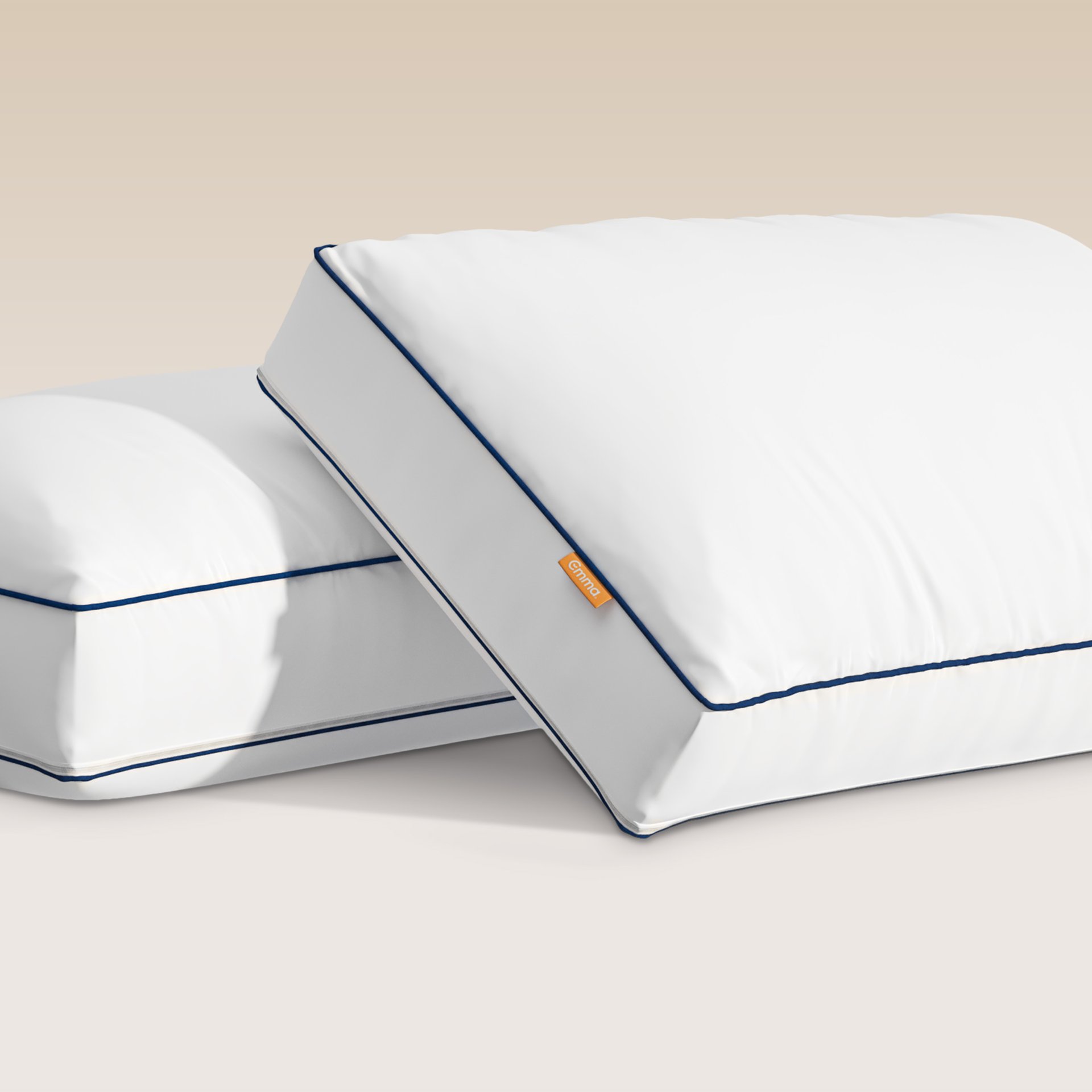 Two Hybrid Pillows on a golden background.