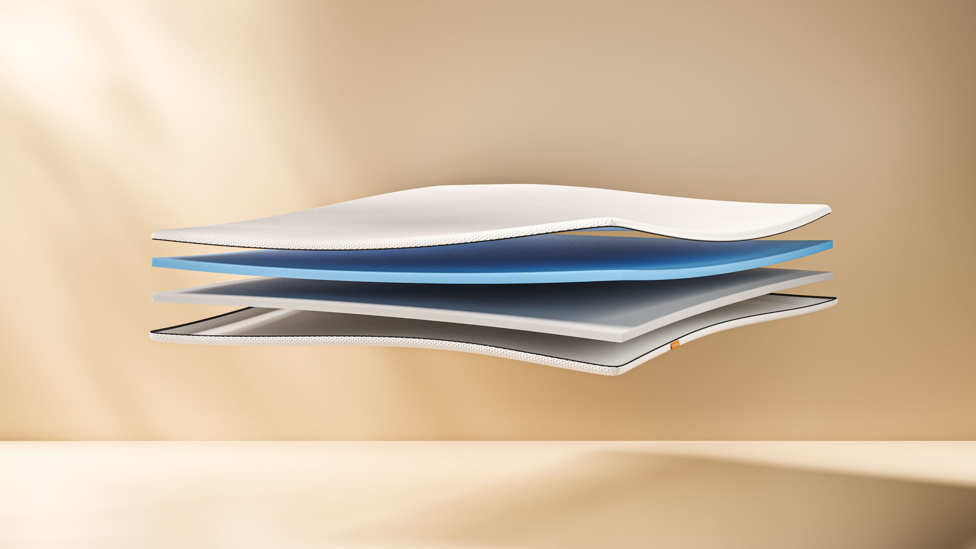The Emma Original Topper cut on the side and showing the expanded layers.
