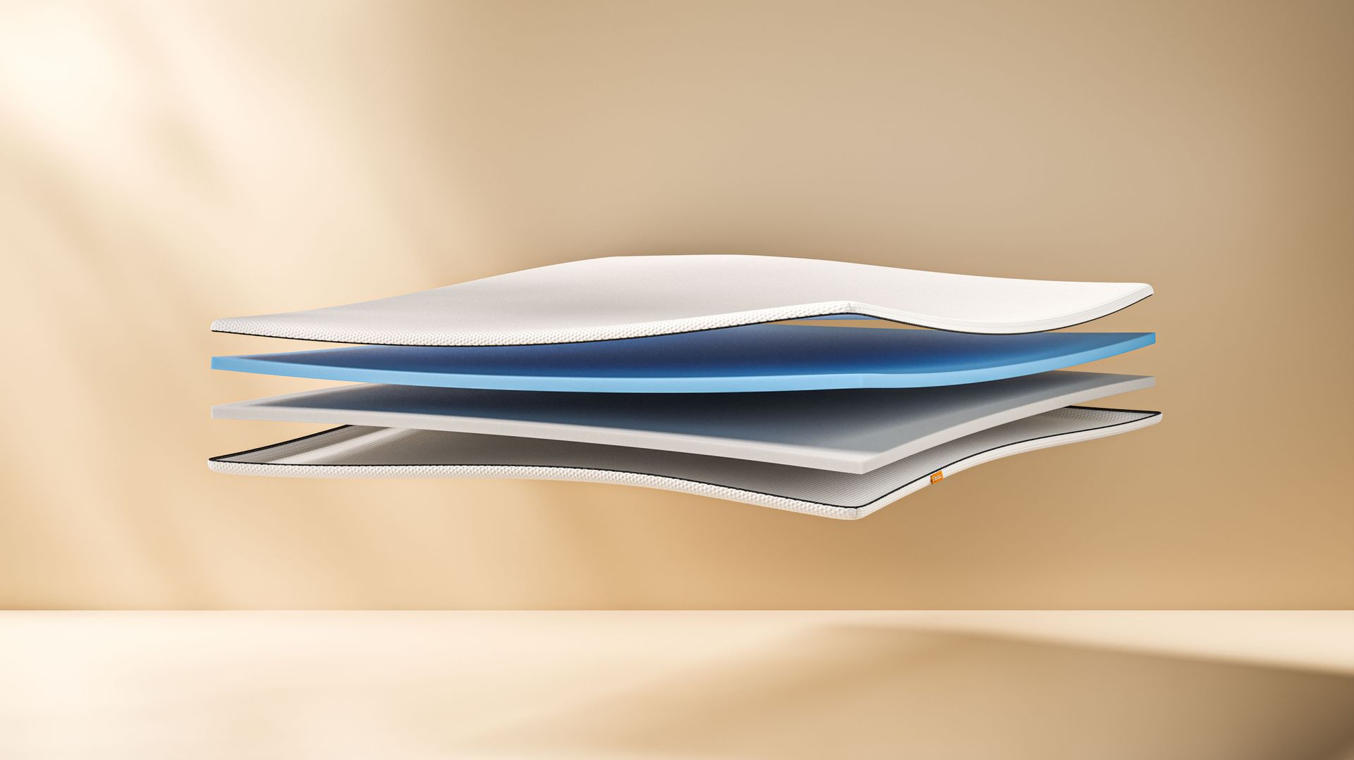 The Emma Original Topper cut on the side and showing the expanded layers.