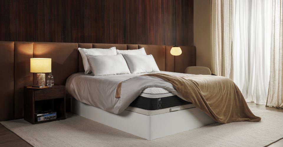 Bedroom with Emma bed, mattress and accessories.