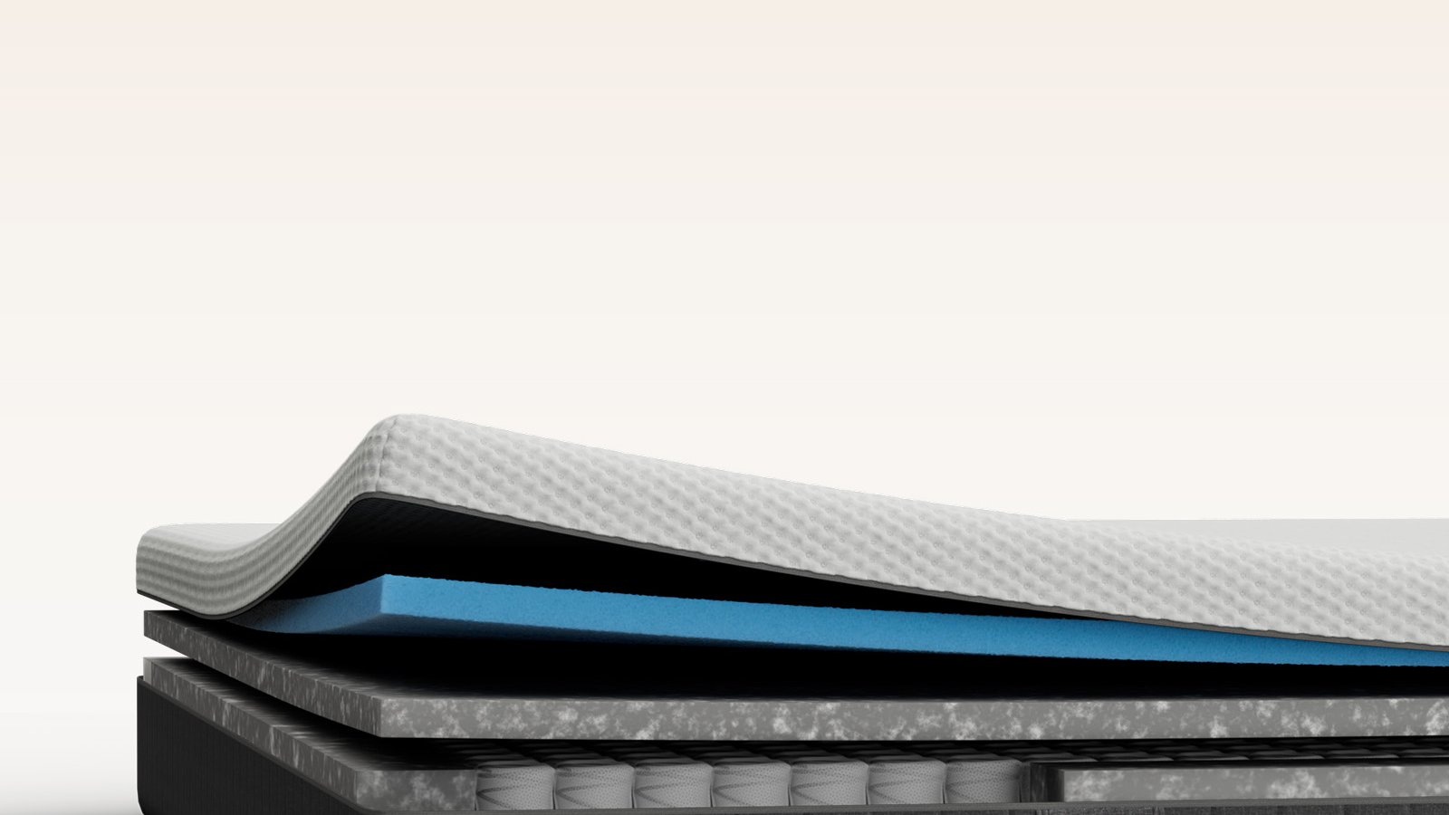 Emma Original Lite mattress layers view showing foam and spring layers with dark grey fabric surround.