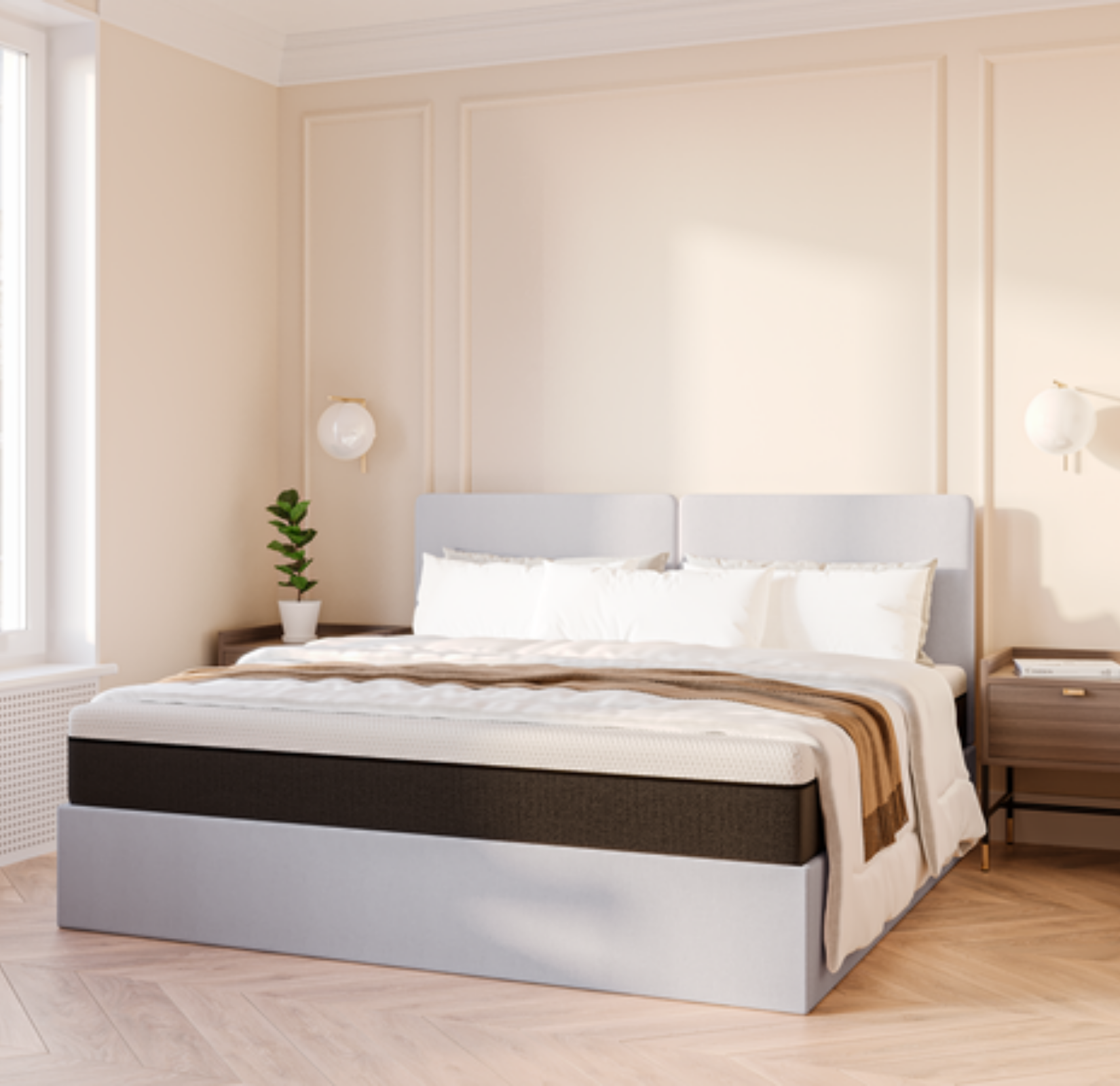 A side view of a bedroom with an Emma Ottoman Storage bed, pillows and bedding.