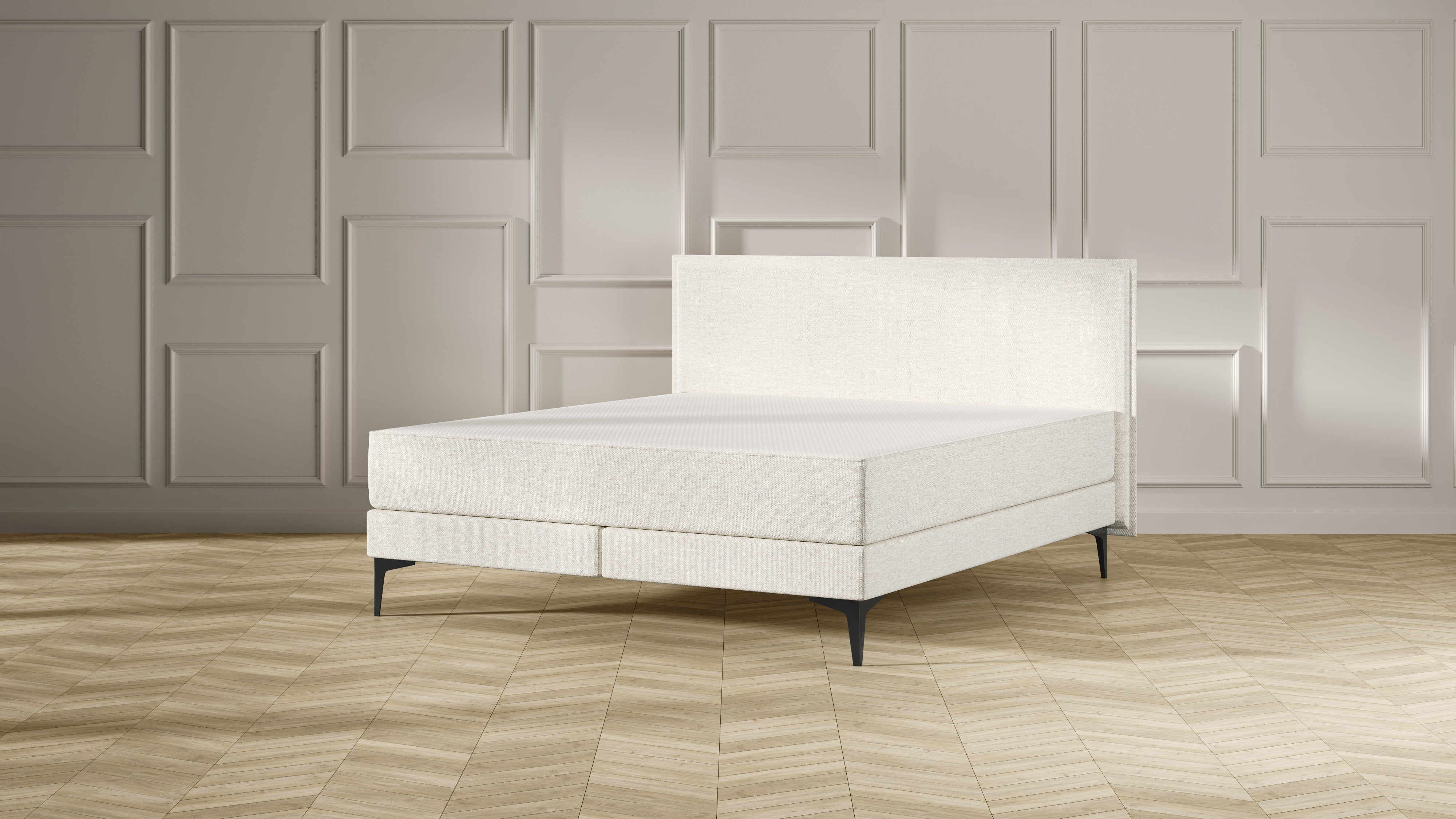 Emma Signature Boxspring bed in beige, met effen hoofdbord en metalen pootjes, geplaatst in een stijlvolle slaapkamer met houten vloer.