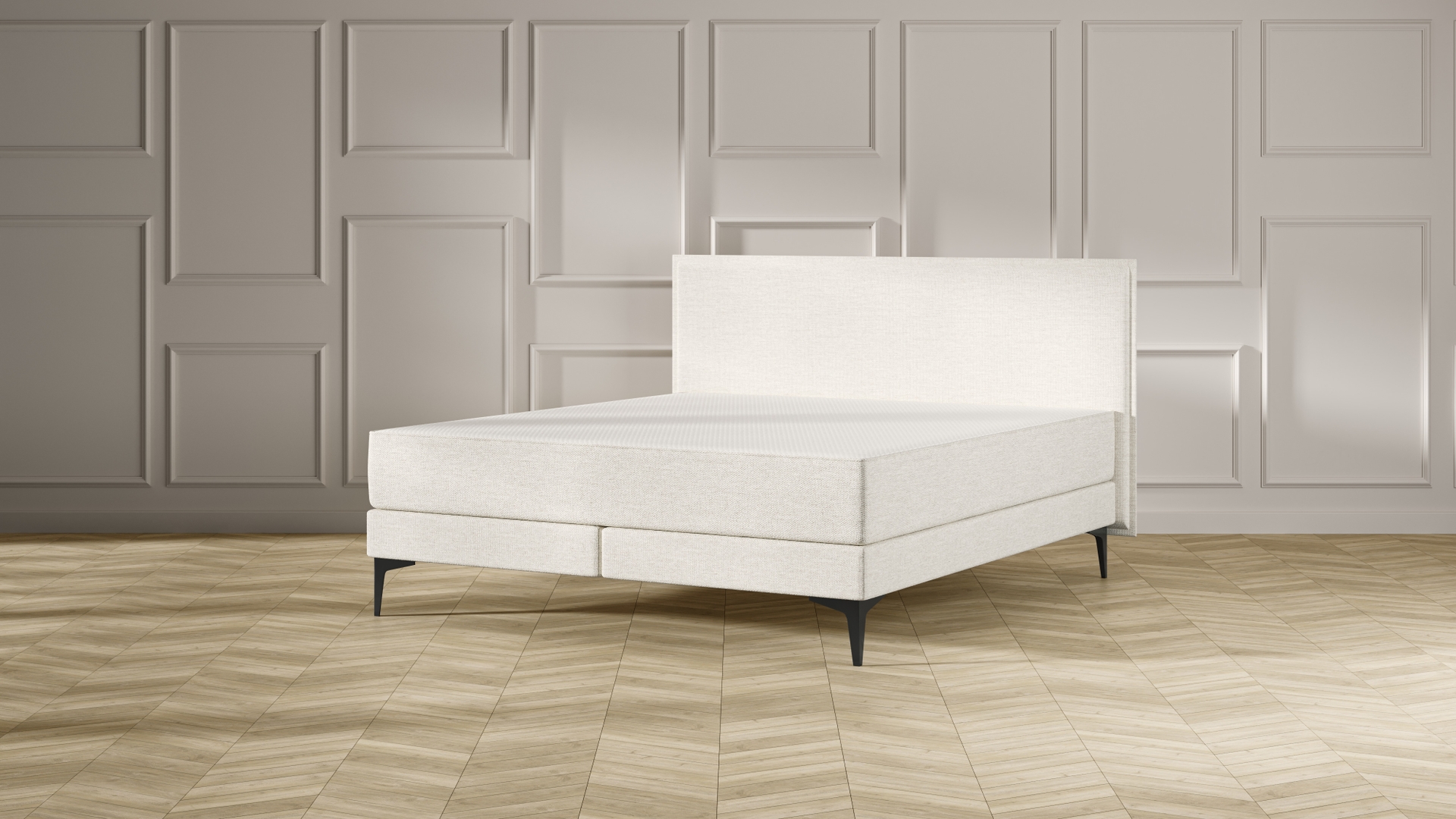 Emma Original Elite Boxspring bed in beige, met effen hoofdbord en metalen pootjes, geplaatst in een stijlvolle slaapkamer met houten vloer.