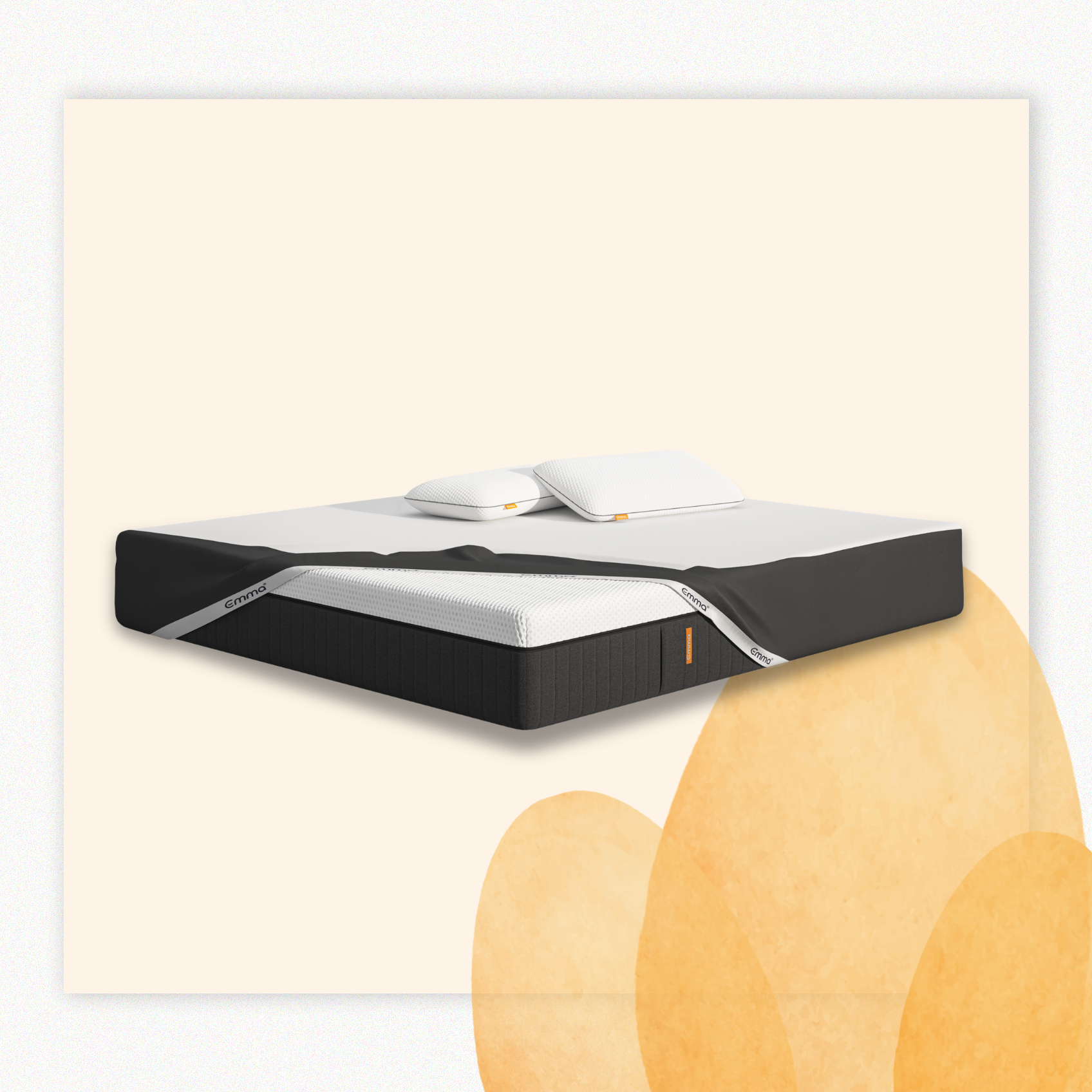 Materasso con superficie superiore bianca e lati scuri, con un cuscino sopra.