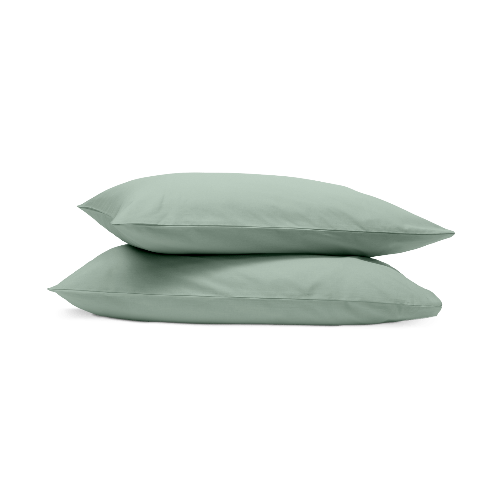 Due federe verde chiaro impilate su sfondo bianco