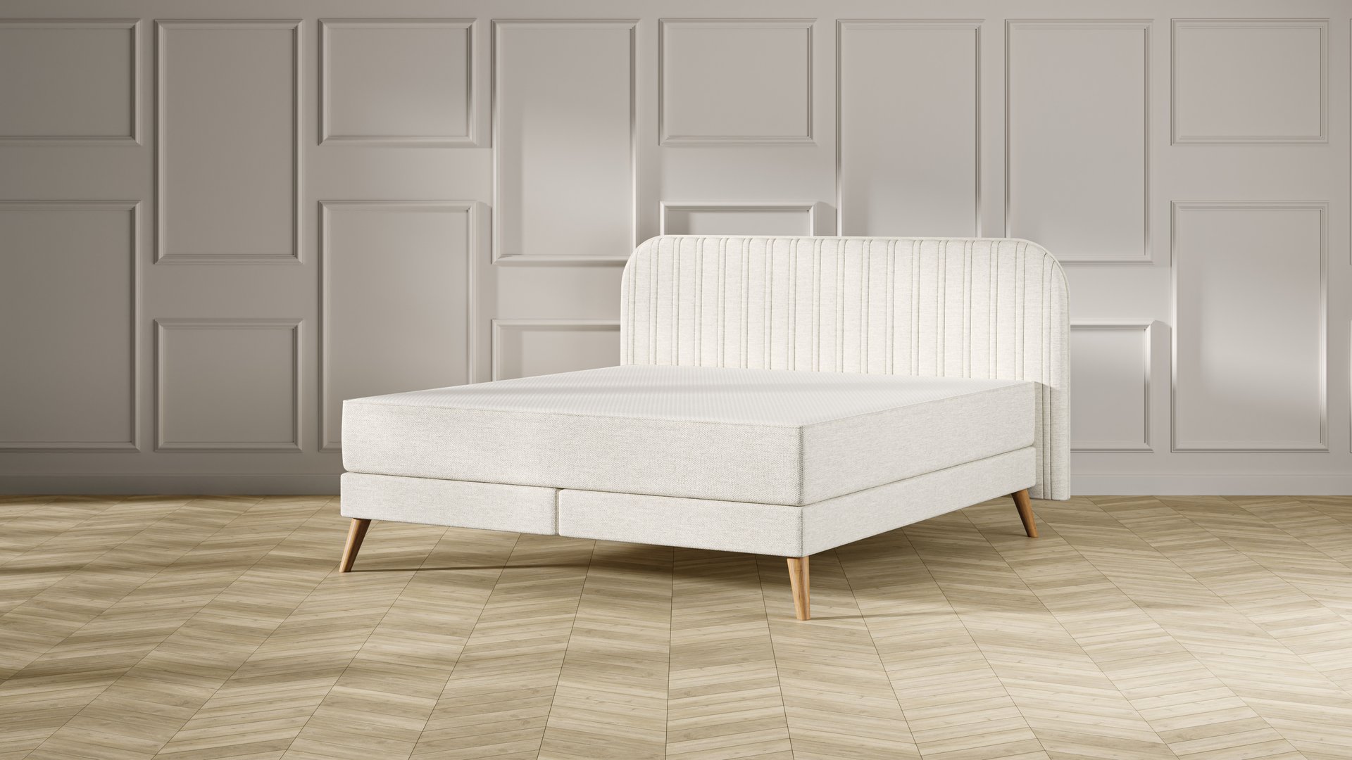 Emma Original Elite Boxspring bed in beige, met gestreept hoofdbord en houten pootjes, geplaatst in een stijlvolle slaapkamer met houten vloer.