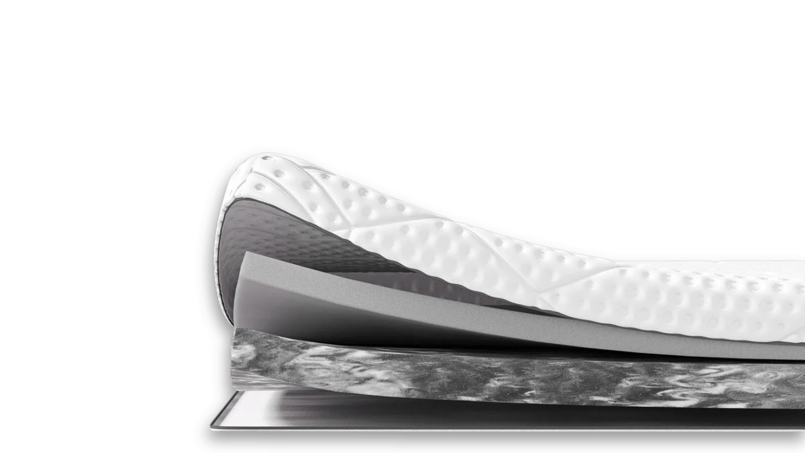 Aufgeschnittener Emma Premium Topper mit sichtbaren Schichten.