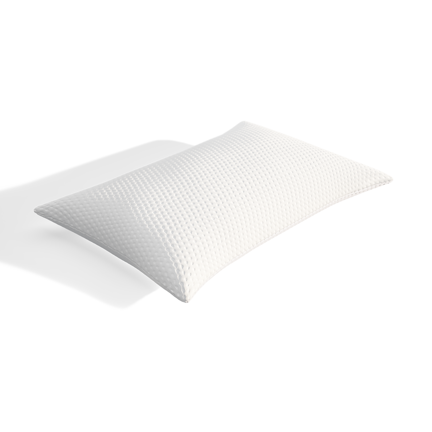 Capa protetora de travesseiro retangular, branca, com padrão quadriculado em relevo. A textura parece macia e confortável. Está sobre uma superfície branca, visto em fundo neutro.