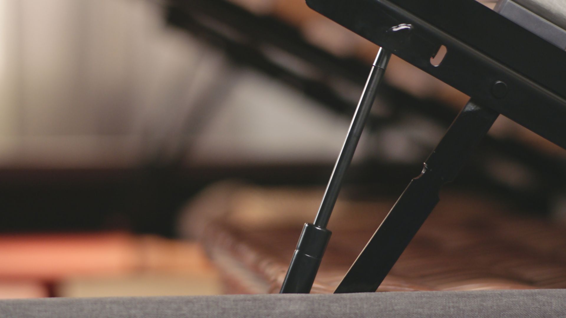 The opening mechanism of the Emma Ottoman Storage bed.