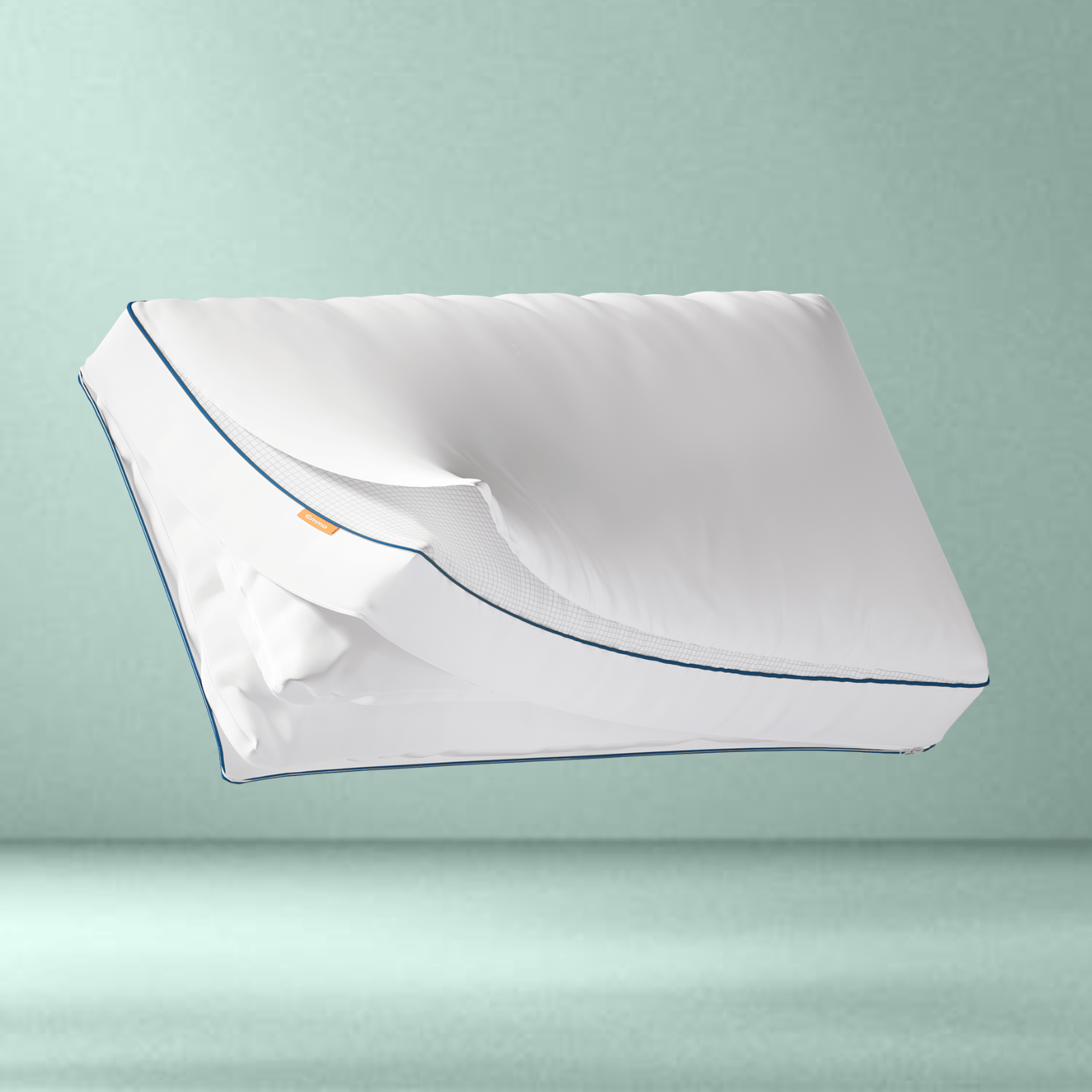 A Emma Comfort Cooling Pillow on a dark grey background.