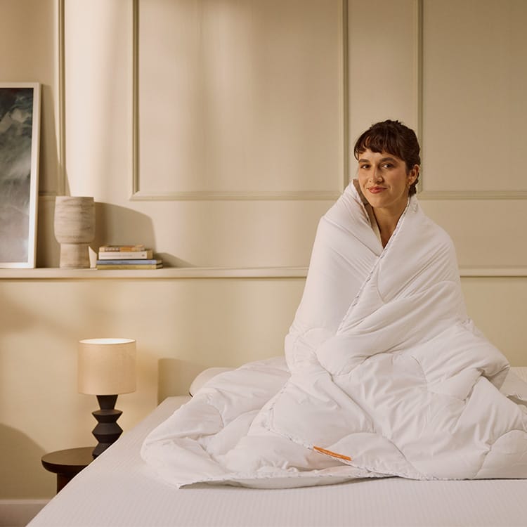 A woman wrapped in a Spring & Autumn Duvet.