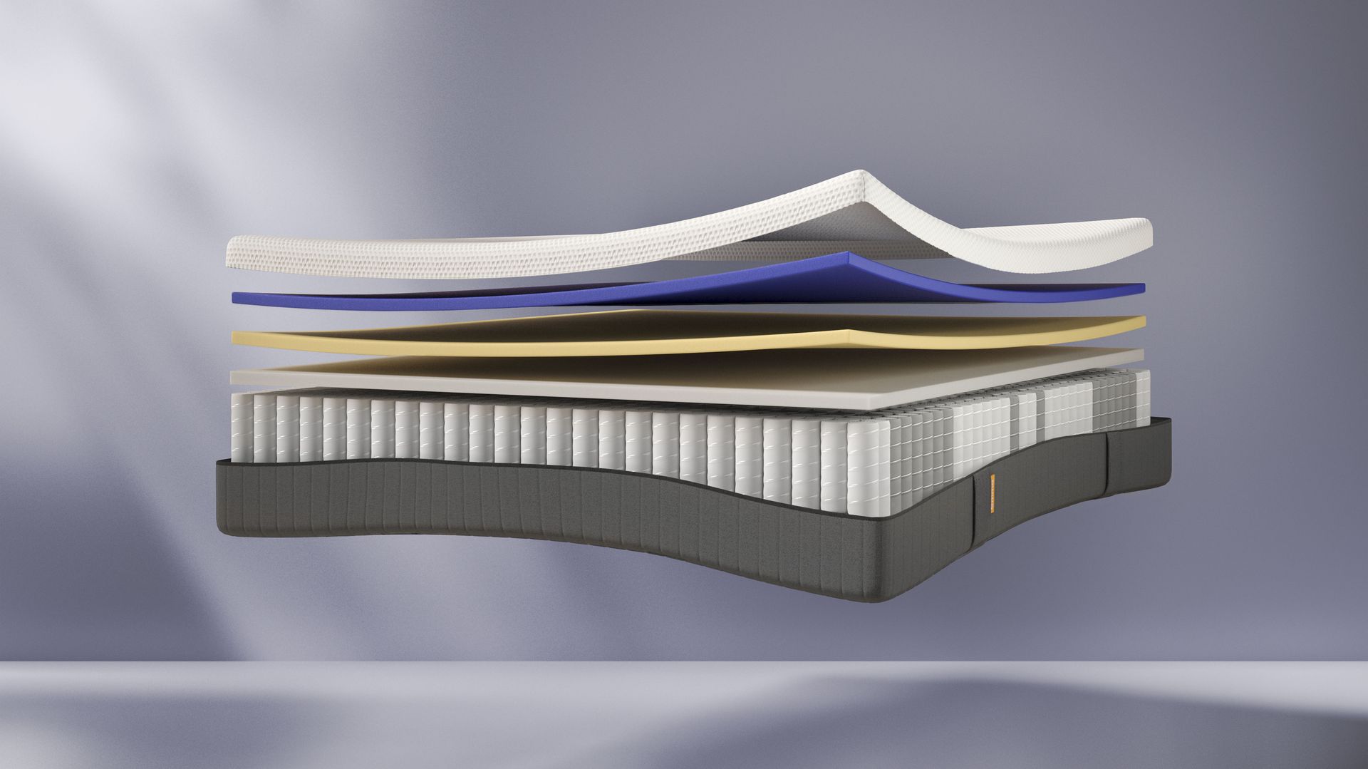 capas del colchón Emma Hybrid Premium en formato exploded con un fondo azul
