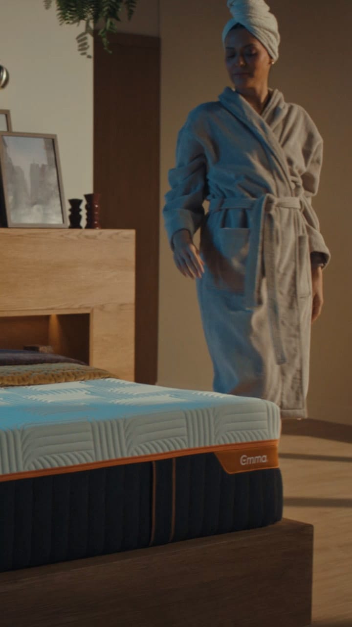 Woman on a bedroom with the mattress