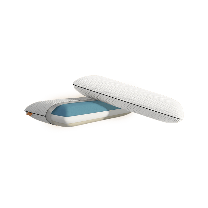 Twee Emma ergonomische kussens, één geopend om de blauwe binnenlaag en witte hoes met textuur te tonen. Ontworpen voor optimale ondersteuning, ademend vermogen en comfort.