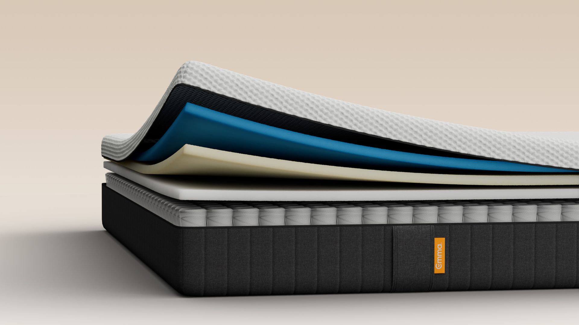 Coupe du matelas montrant des couches de mousse sur ressorts ensachés.