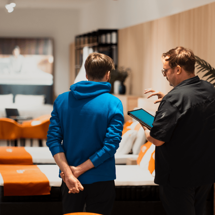 Two men at an Emma store.