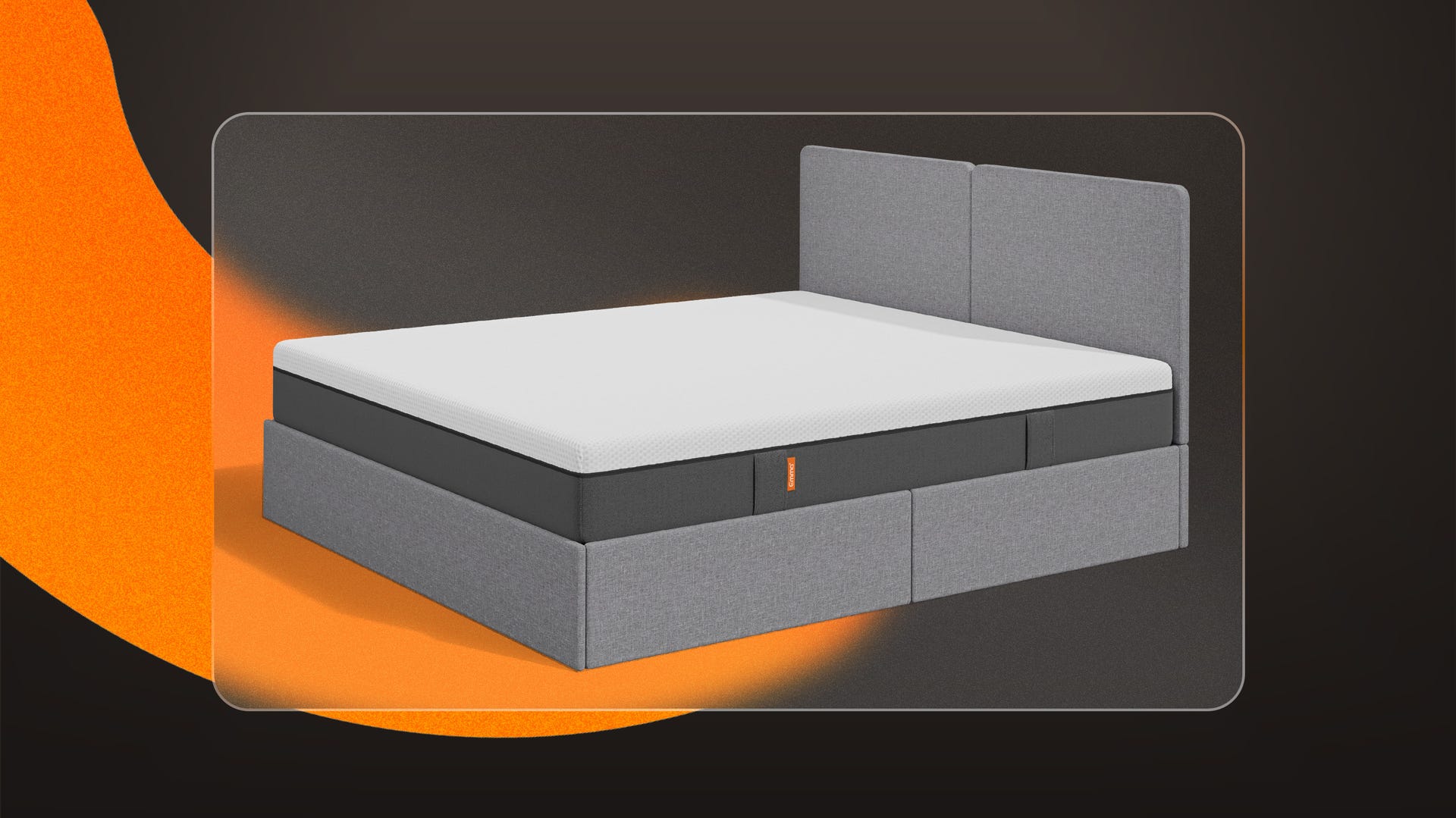 An Emma ottoman storage in a well lit bedroom. The bed has pillows and a duvet on top.