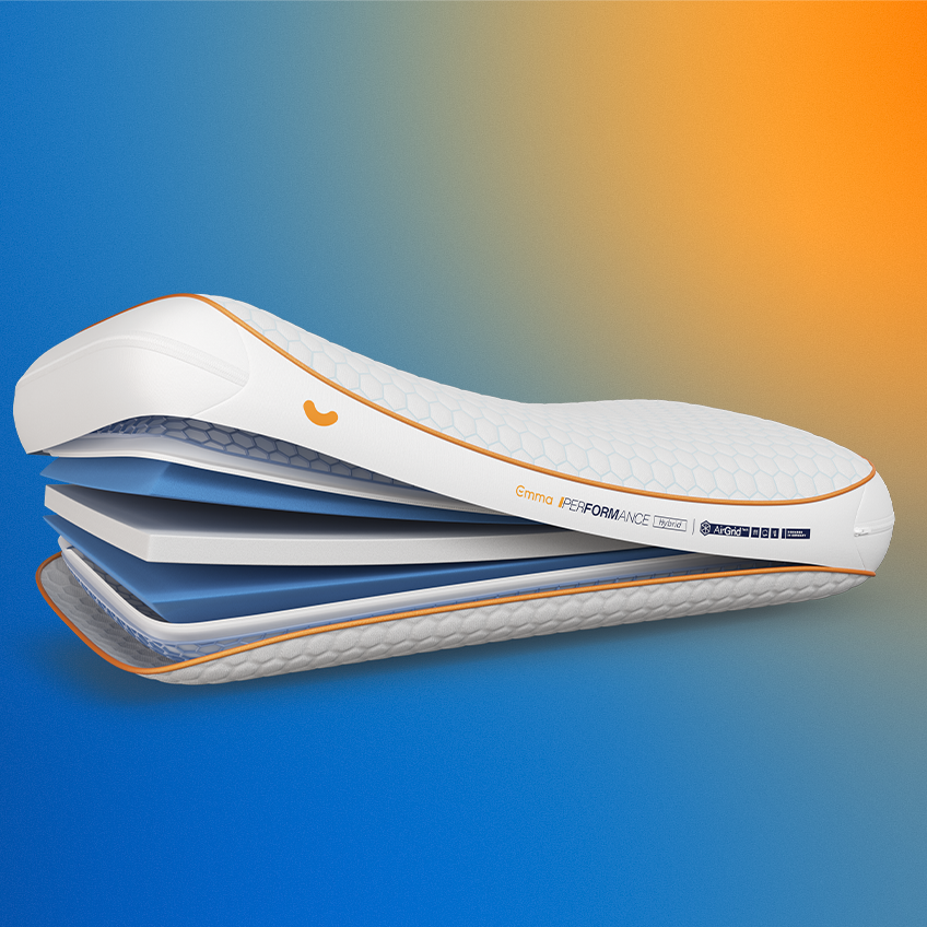 Emma Performance Adapt Pillow render showing internal layers including AirGrid and foam on a blue-orange gradient background.