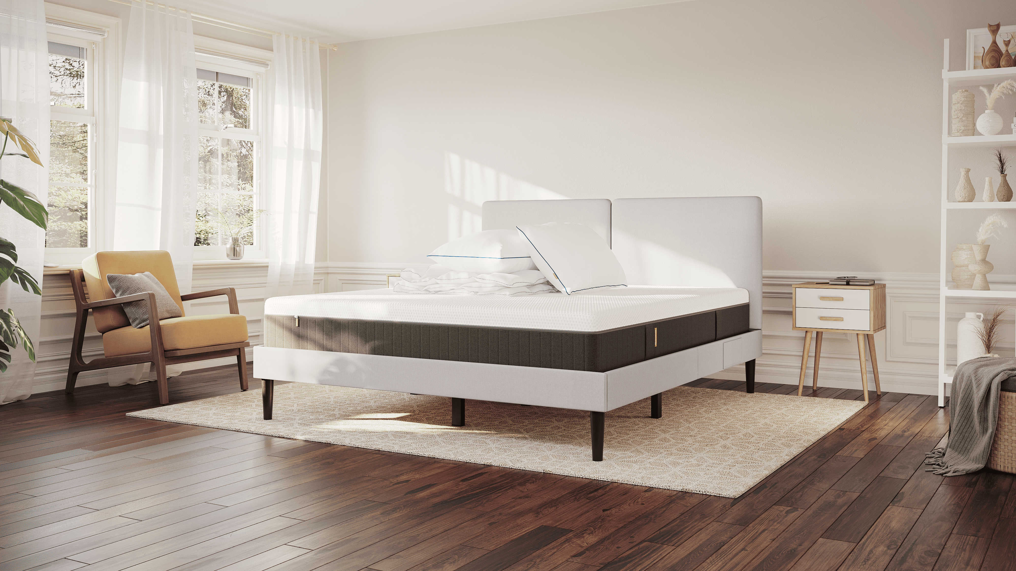 Emma Original Deal Plus: lichtgrijs Emma Original Bed met Hybrid II Adjustable matras, twee Premium Wolkenkussens en een Emma dekbed in een moderne slaapkamer met natuurlijke lichtinval.