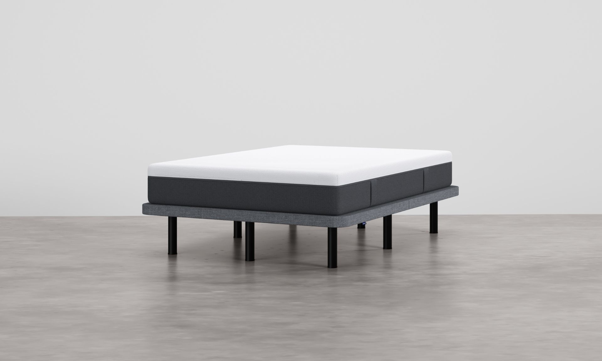 Base tapizada gris con colchón Emma