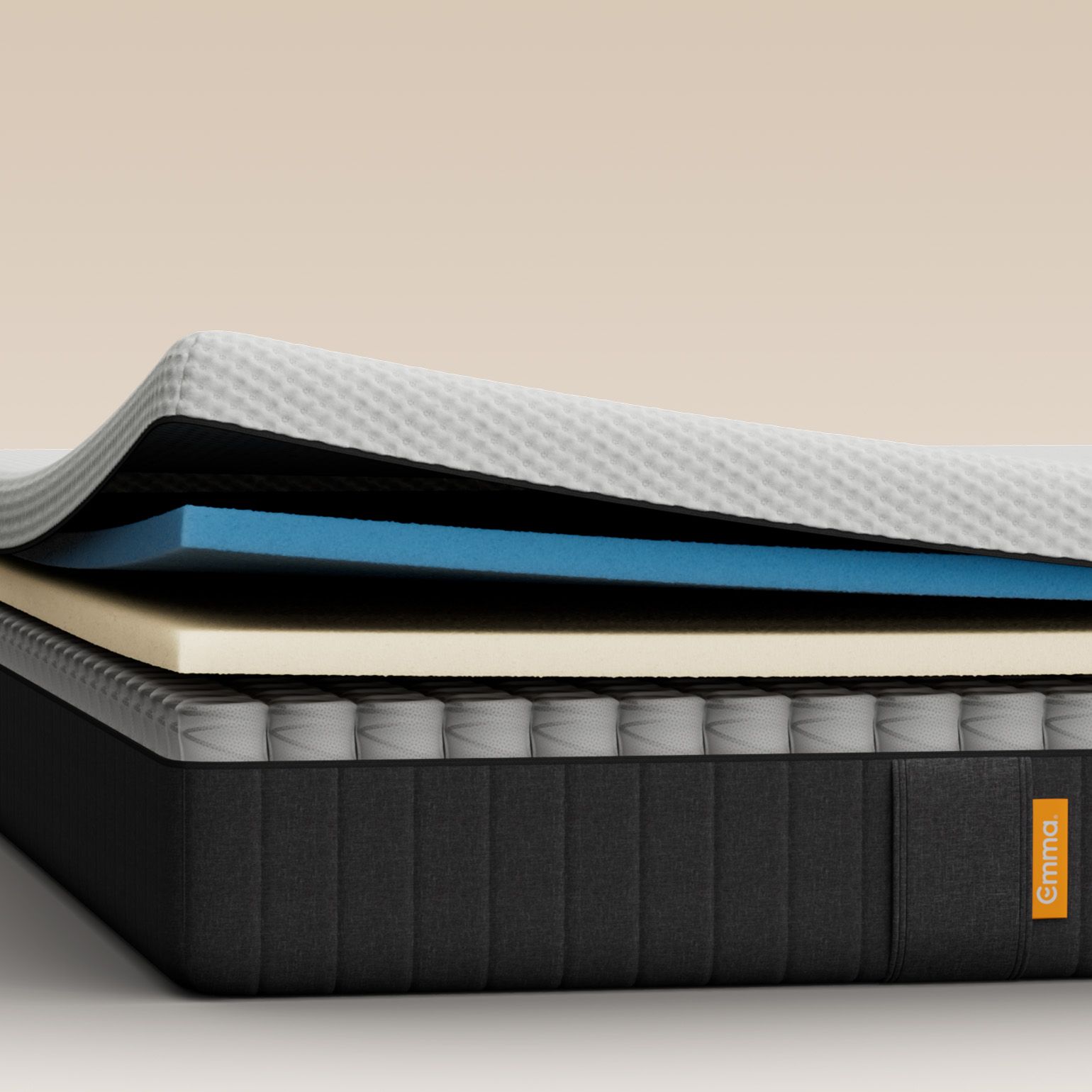 Cross-section view of the Emma Hybrid mattress showing its layers of memory foam and pocket springs.