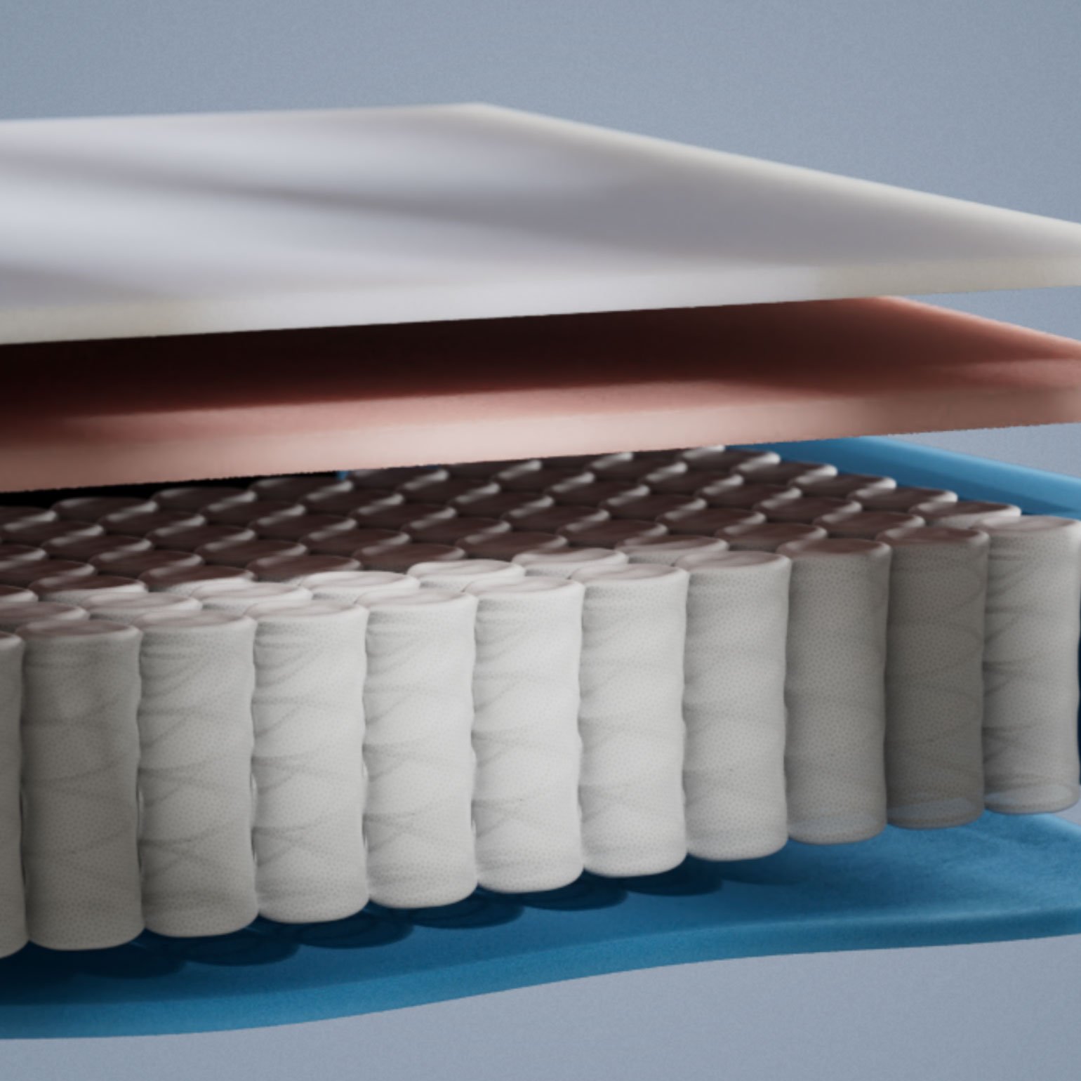 Emma Original Lite mattress layers view showing blue foam layer above a pocket spring core in close-up detail.