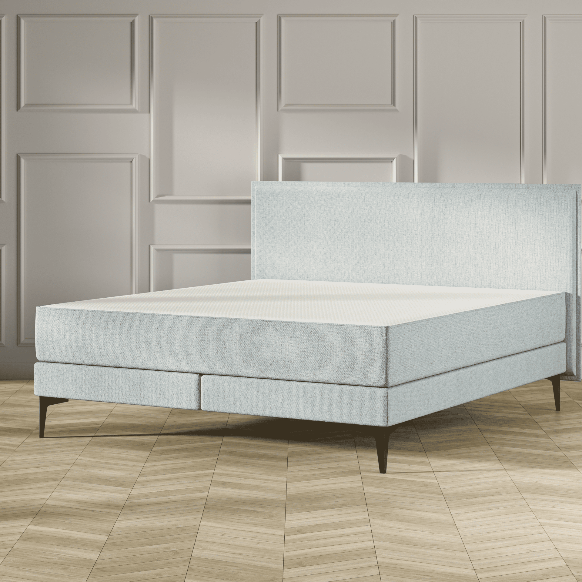 Emma Original Elite Boxspring bed in mint groen, met effen hoofdbord en metalen pootjes, geplaatst in een stijlvolle slaapkamer met houten vloer.