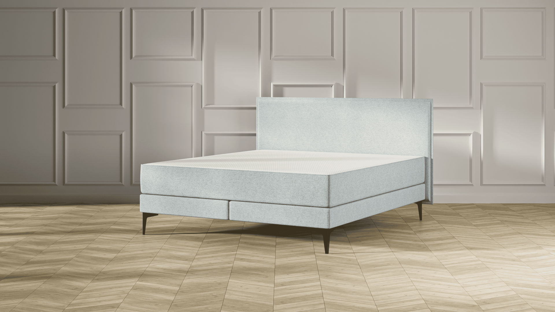 Emma Original Elite Boxspring bed in mint groen, met effen hoofdbord en metalen pootjes, geplaatst in een stijlvolle slaapkamer met houten vloer.