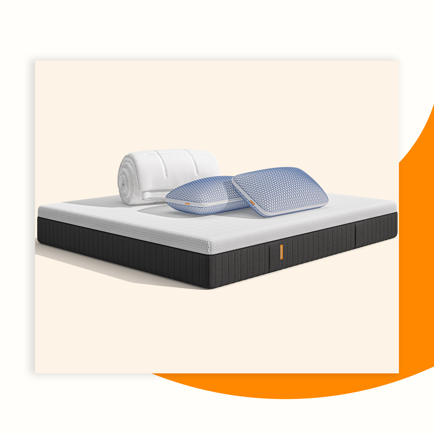  Uma imagem do Pack Cooling Pro, que inclui um colchão Emma Hybrid Premium+ , almofadas Microfibra Zero Gravity, e uma capa protetora