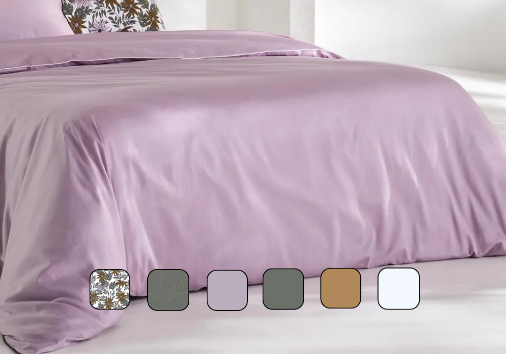 Image en gros plan d’une housse de couette sur un lit.