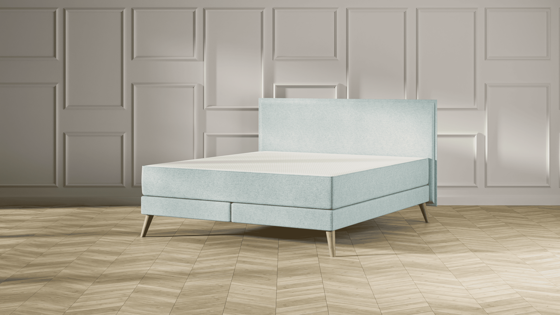 Emma Original Elite Boxspring bed in mint groen, met effen hoofdbord en houten pootjes, geplaatst in een stijlvolle slaapkamer met houten vloer.