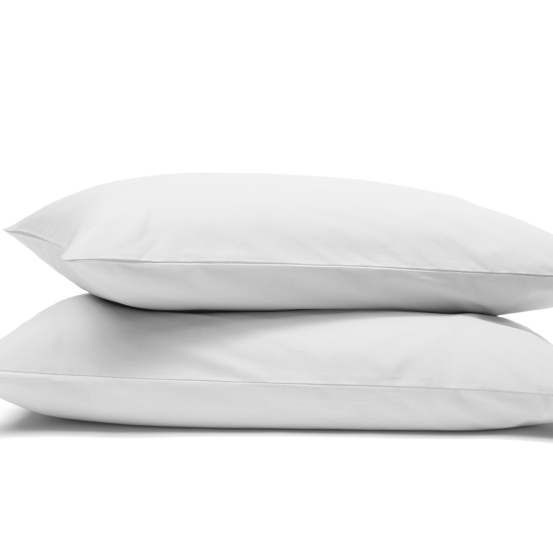 Uma imagem com fronhas de almofada Emma, em branco