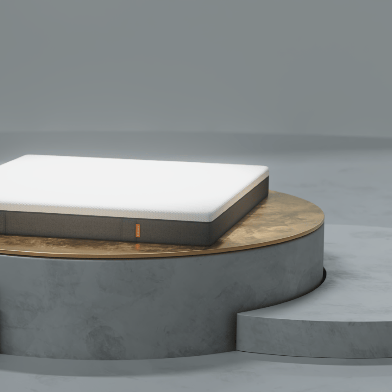 Emma-Matratze auf rundem Podest in minimalistischem Setting
