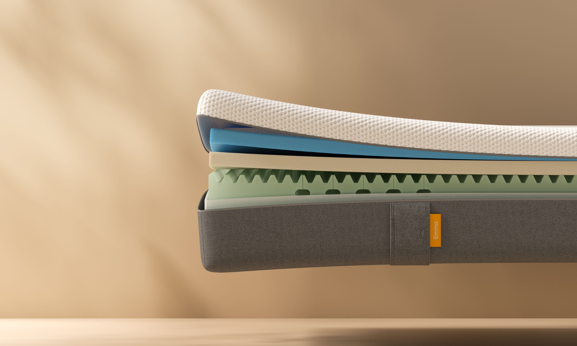 Colchón emma original de 3 capas de espuma sobre fondo amarillo