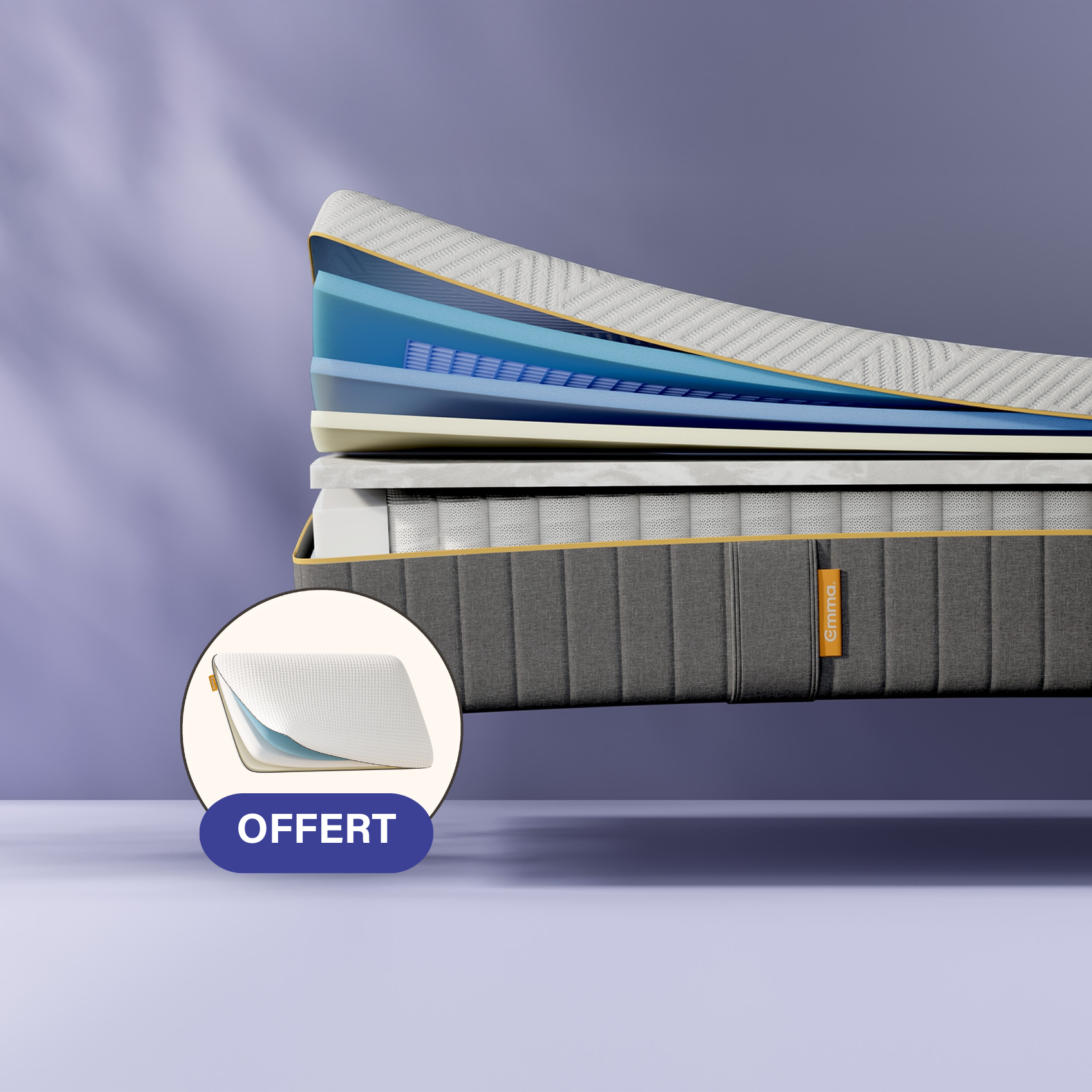 Coupe transversale d'un matelas montrant plusieurs couches, dont une couche supérieure texturée blanche, des couches intermédiaires bleues et jaunes, et un sommier dont les ressorts sont visibles. Le matelas porte l'inscription "Emma" sur le côté.