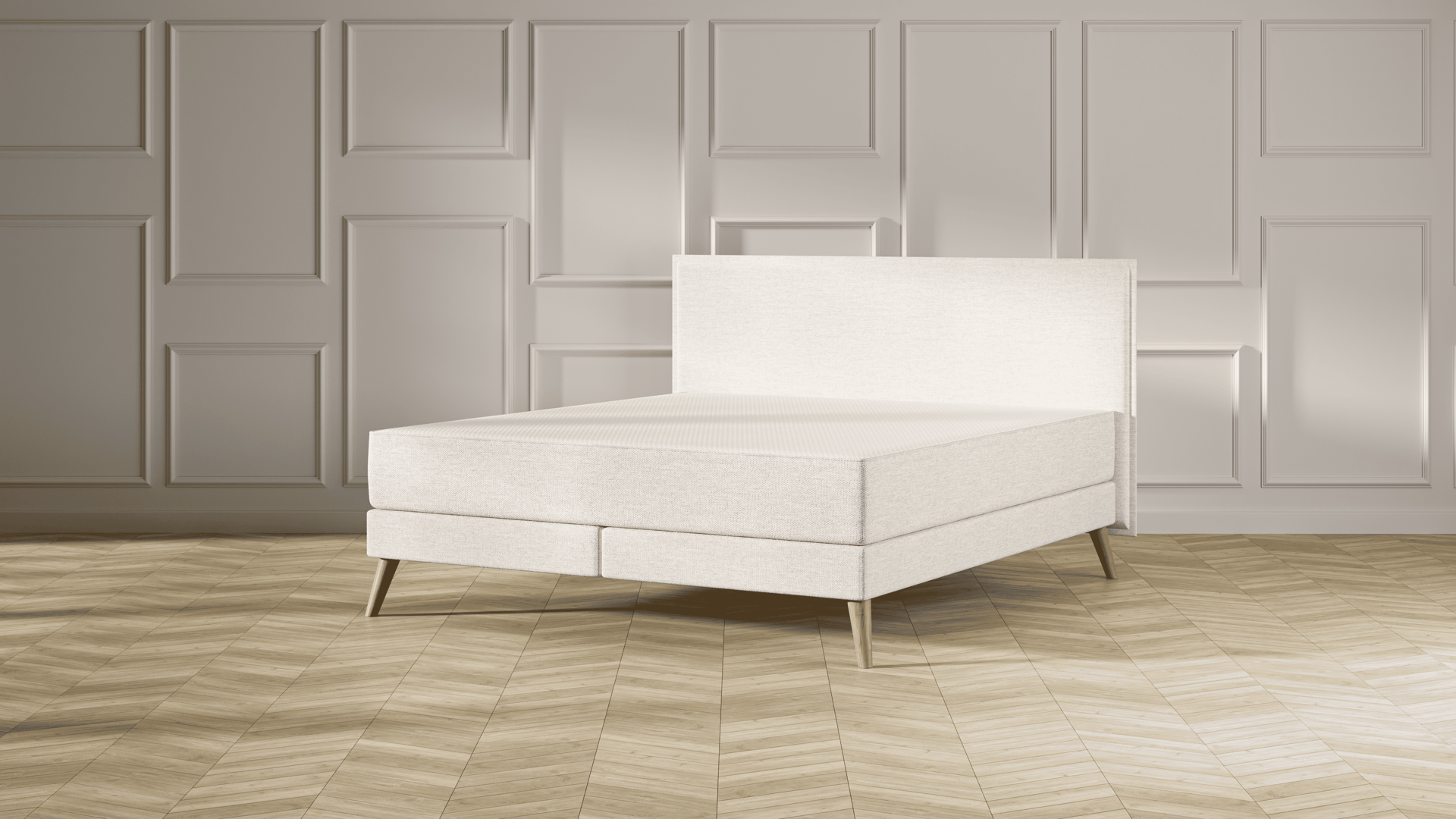 Emma Original Elite Boxspring bed in beige, met effen hoofdbord en houten pootjes, geplaatst in een stijlvolle slaapkamer met houten vloer.
