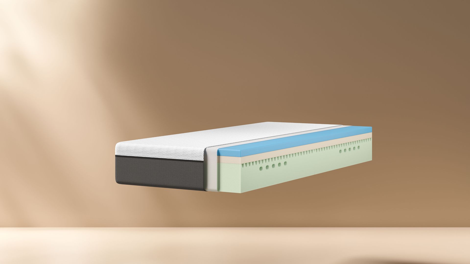 Sezione trasversale di un materasso con strati bianco, grigio scuro, verde traforato e blu, su sfondo beige