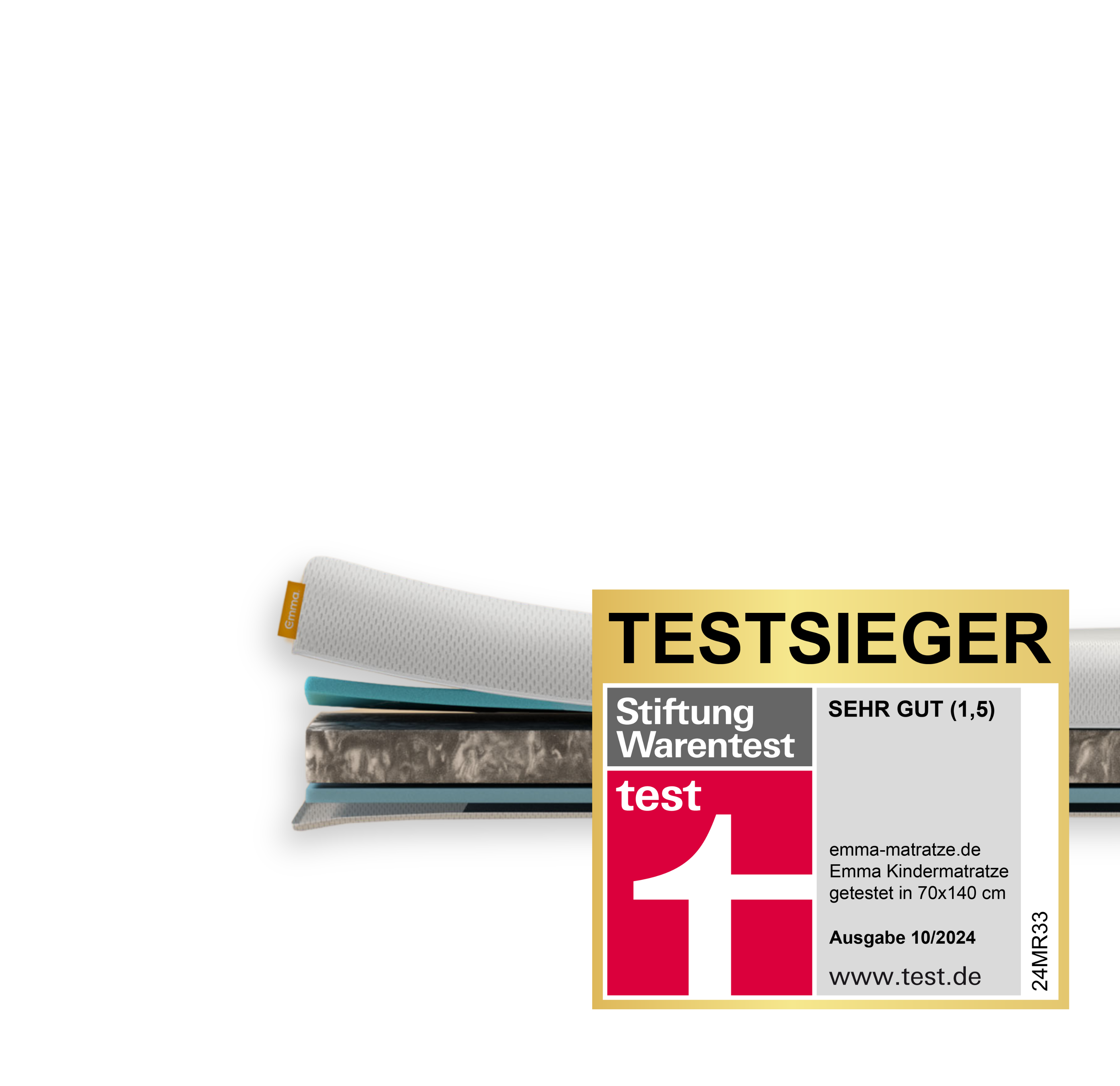 Aufgeschnittene Emma Kindermatratze mit sichtbaren Schichten und Stiftung Warentest Siegel.