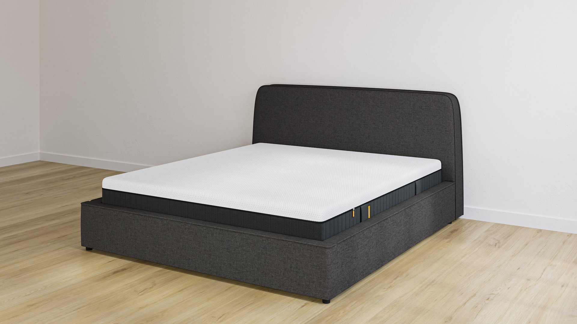 Emma storage bed in charcoal upholstery with headboard and Original Elite mattress, on light wood floor.