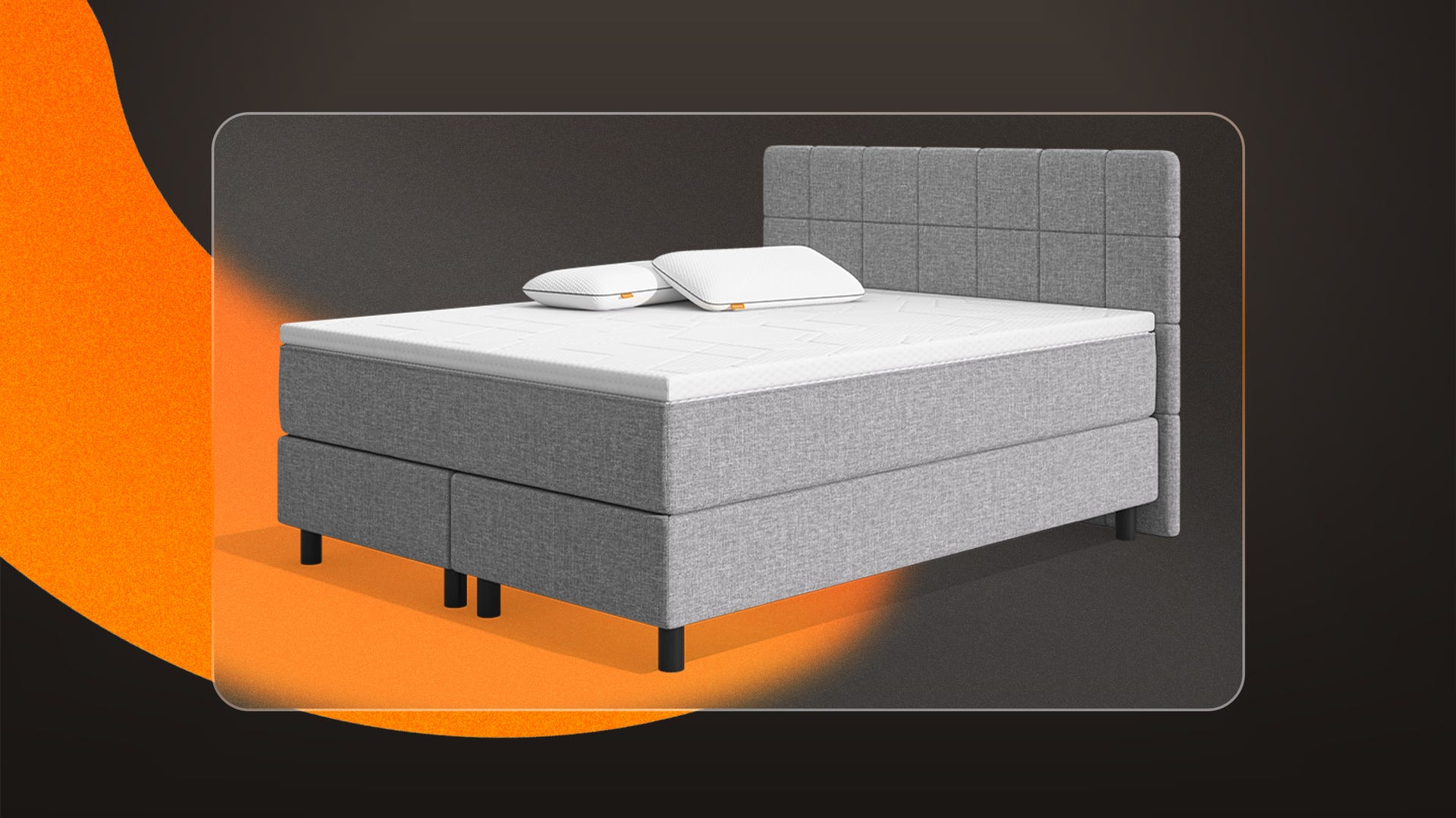 Das original Boxspringbett mit 2 Polster und einer Matratzenauflage in einem Zimmer mit blauen Wänden.