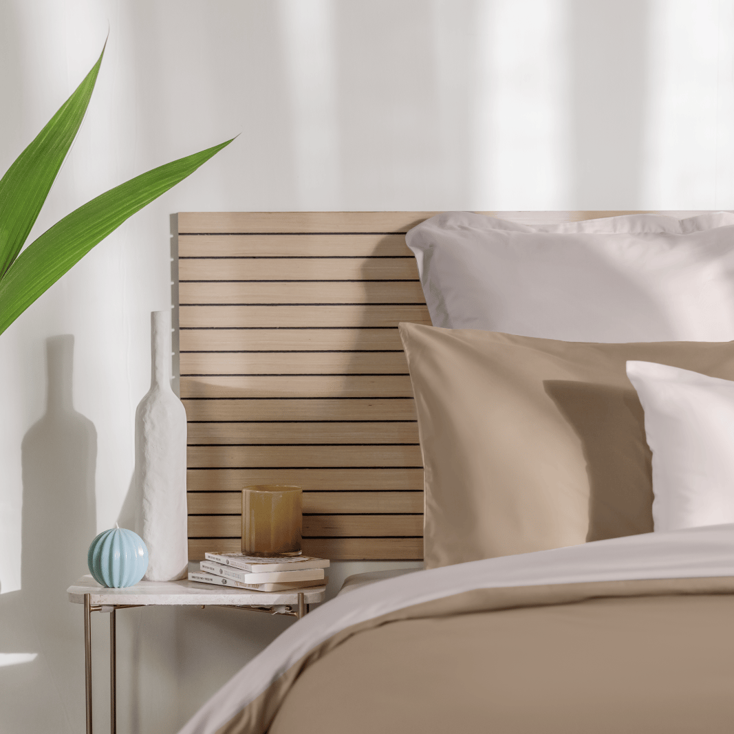 Uma imagem da roupa de cama Emma em bege e creme reversivel