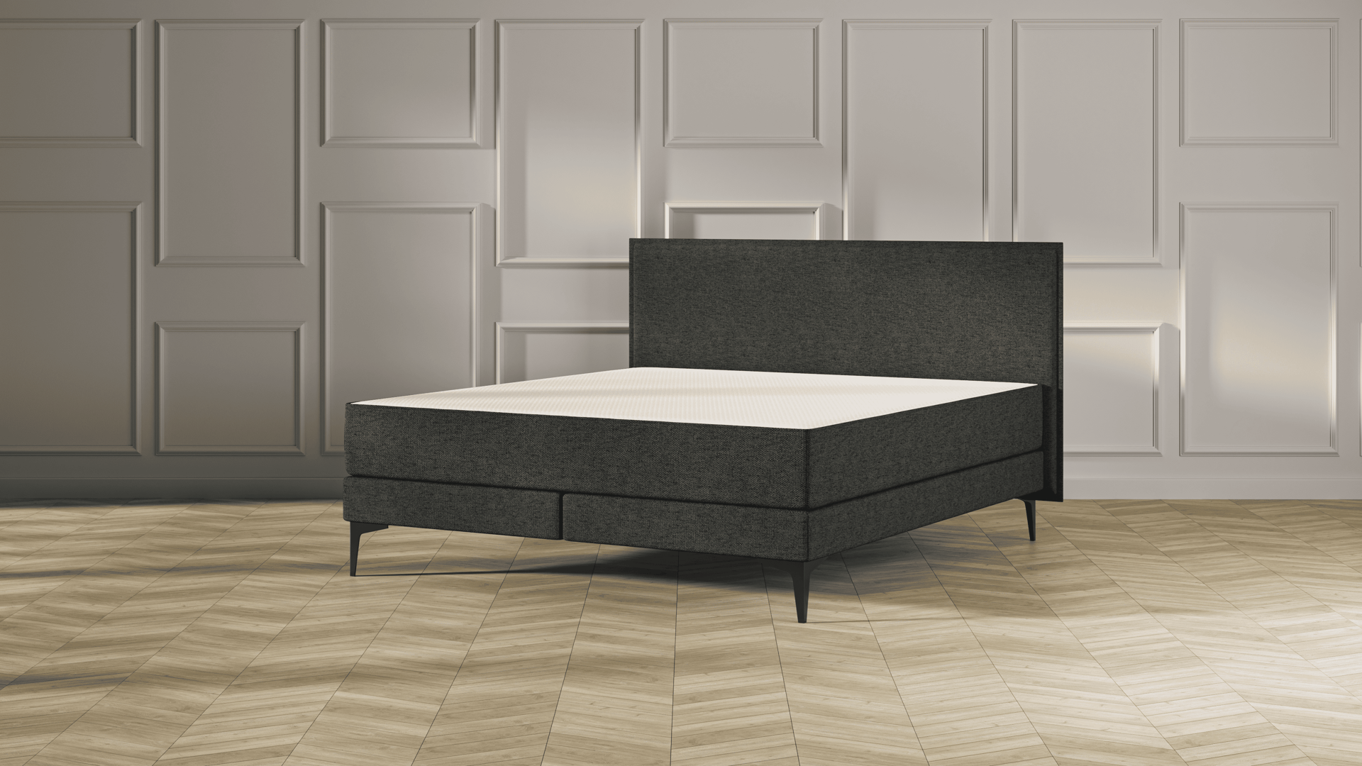 Emma Original Elite  Boxspring bed in donkergrijs, met effen hoofdbord en metalen pootjes, geplaatst in een stijlvolle slaapkamer met houten vloer.