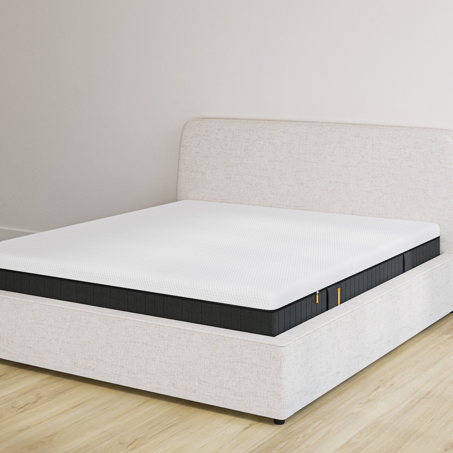 Emma storage bed in sand upholstery with headboard and Original Elite mattress, on light wood floor.