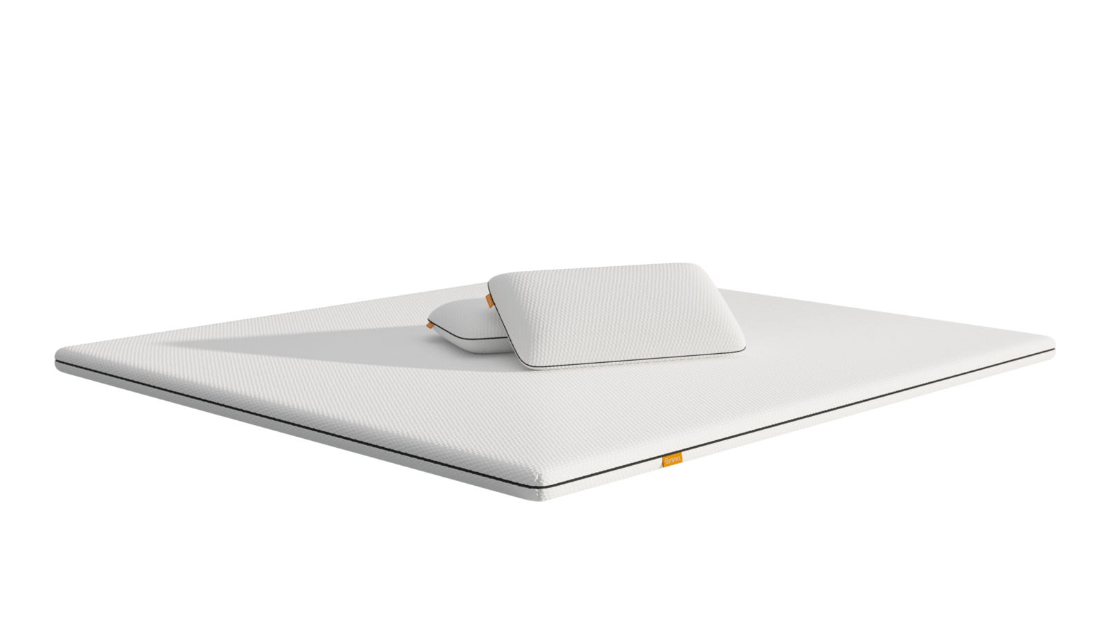 Imagem de um casal feliz, a pousar um zobrecolchão reversível Emma na sua cama