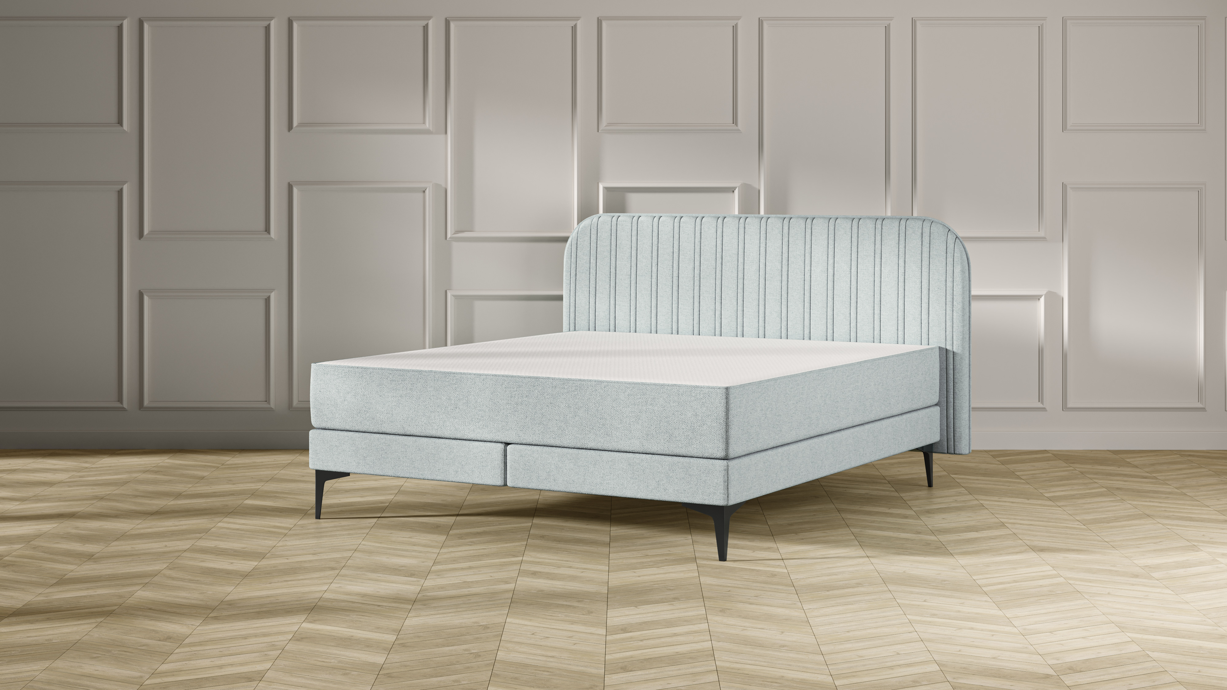 Emma Signature Boxspring bed in mint groen, met gestreept hoofdbord en metalen pootjes, geplaatst in een stijlvolle slaapkamer met houten vloer.