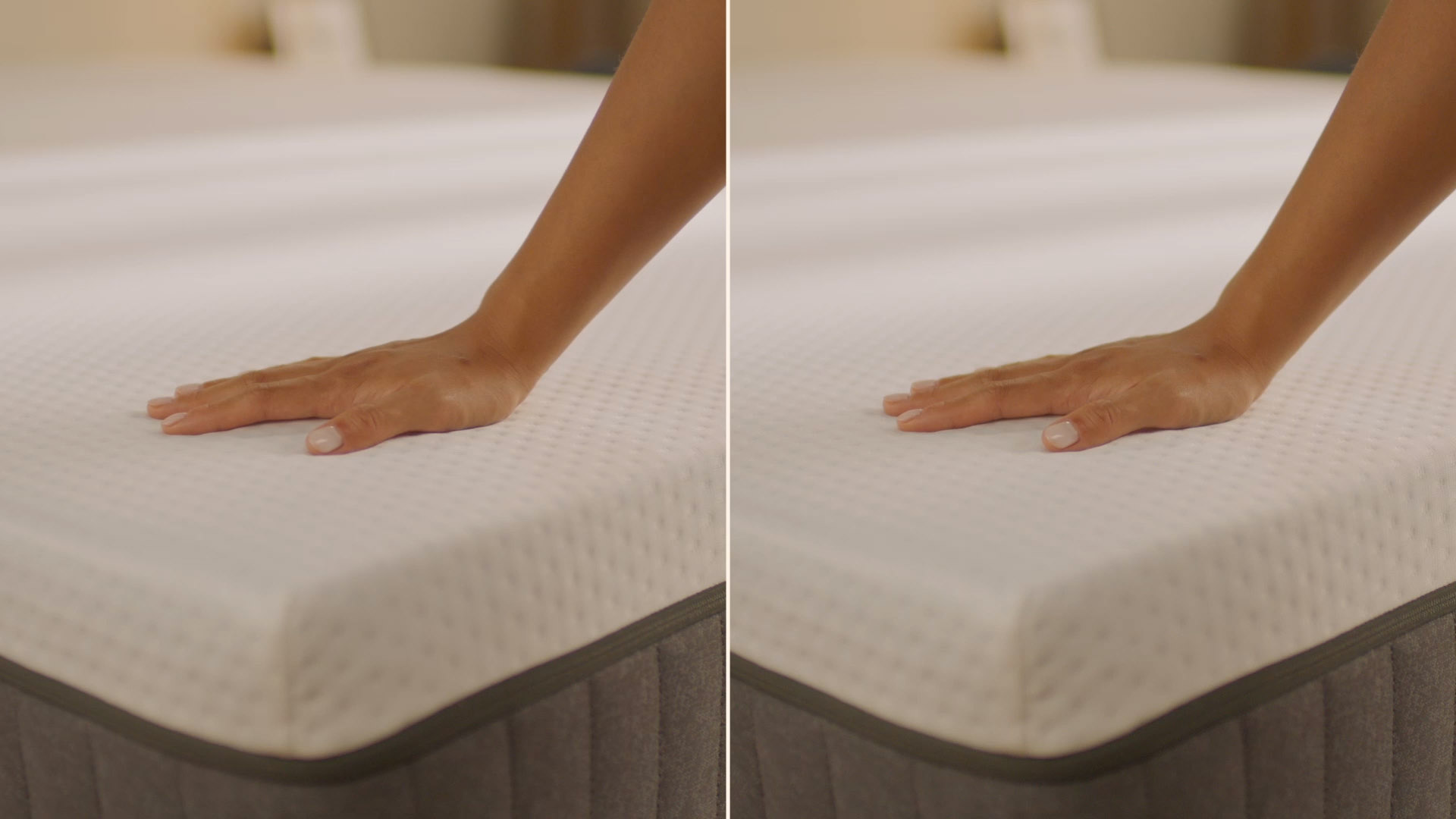Person pressing the mattress surface to show its feel.